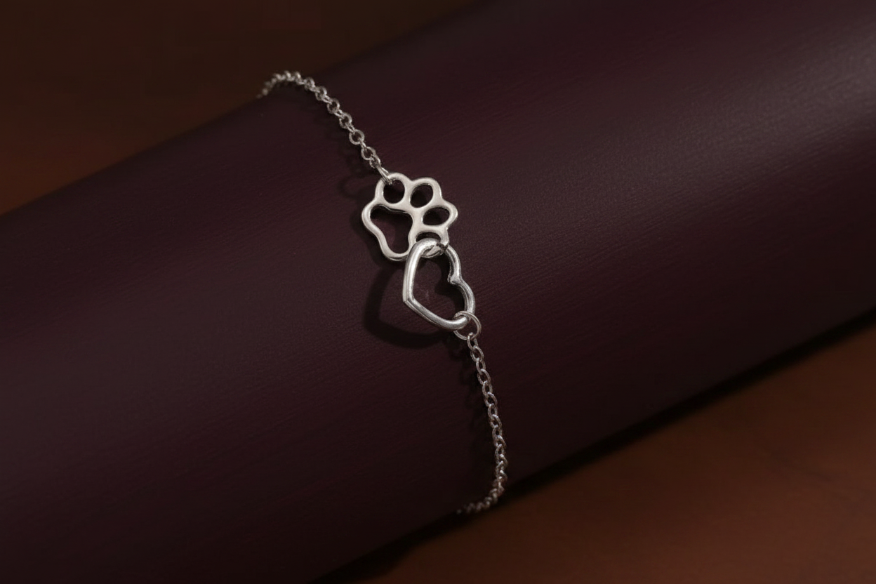Silver plated bracelet or anklet with paw print and heart, you pick the size.
