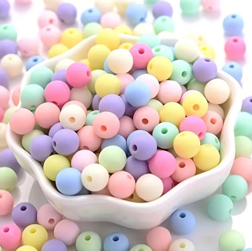 100 Acrylic multicolored beads with hole for bead work